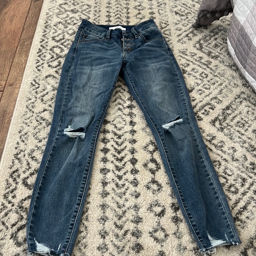 Kan Can button fly distressed skinny ankle jeans